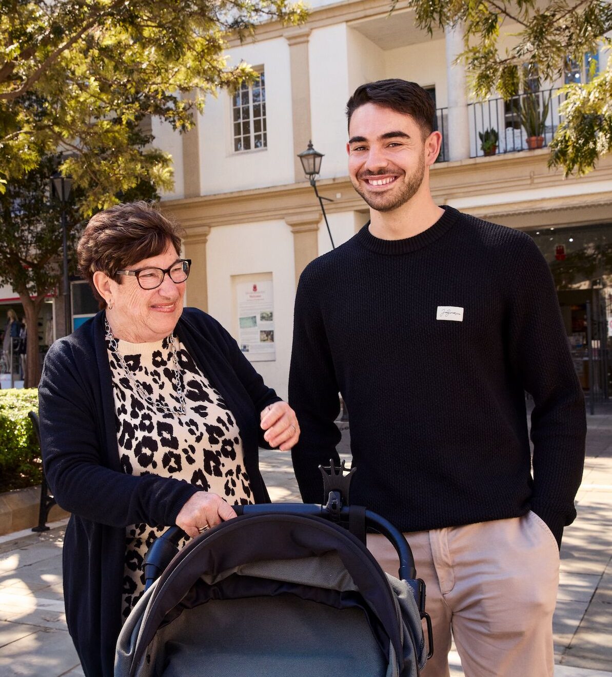People outside with a pram